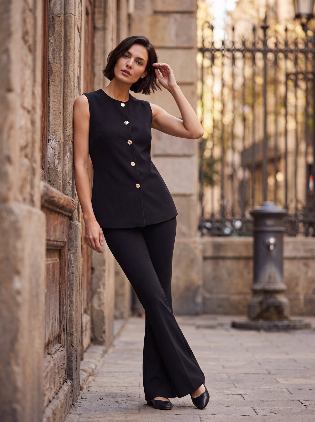 Black Sleeveless Button Detail Top - Luxury women's fashion by Lioness Walk